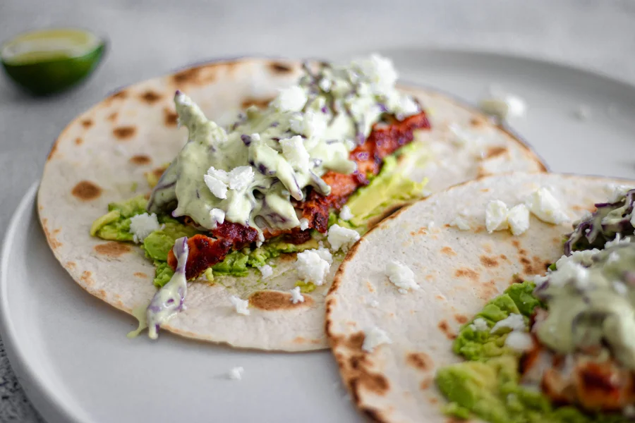 Harissa honey fish tacos with slaw