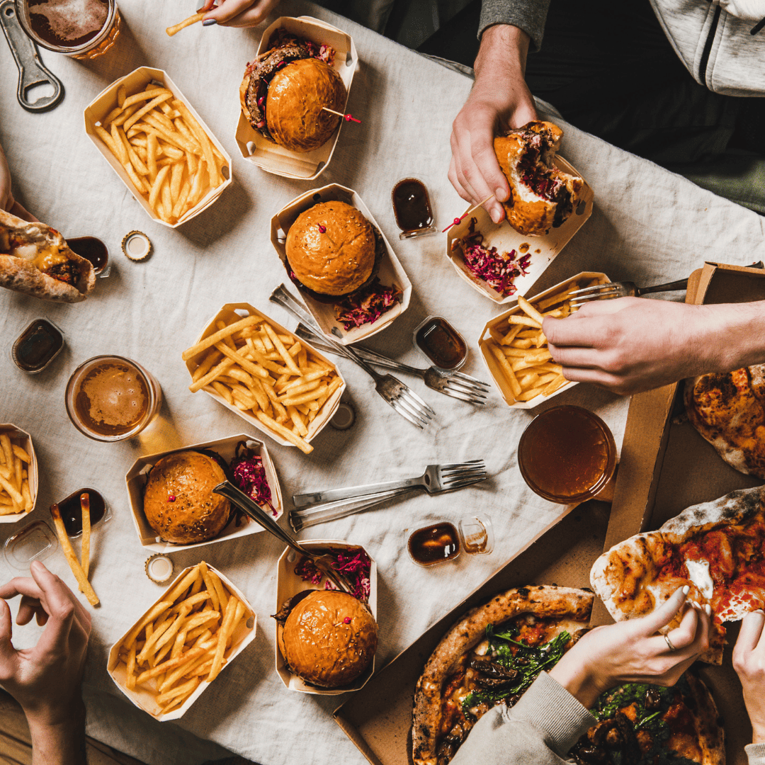 A table of high calorie, high fat foods that are commonly eaten on a night out